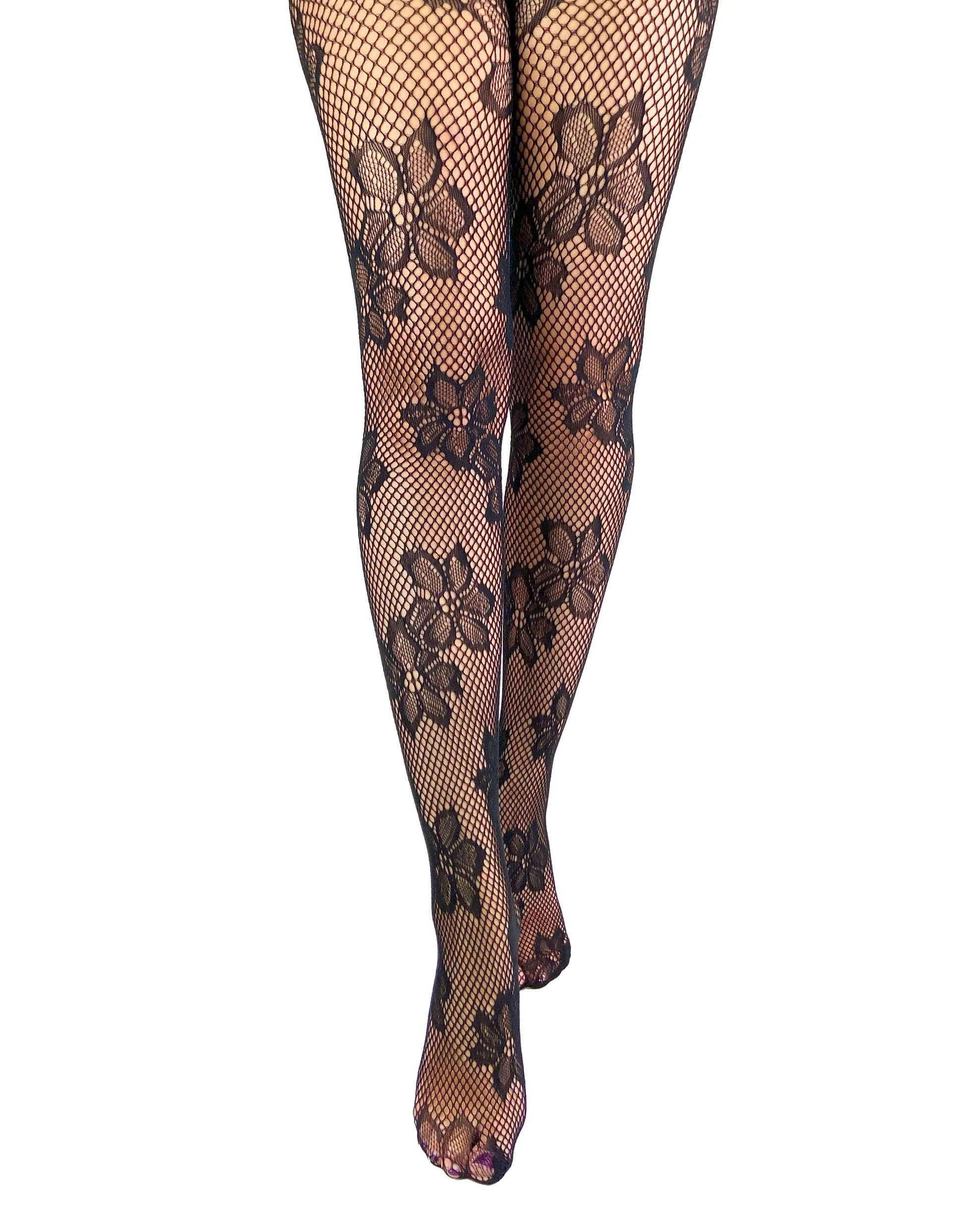  FRONT Black floral lace fishnet stockings on a white background